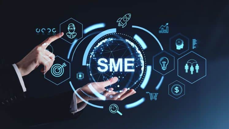 A digital globe displaying 'SME' surrounded by various business icons, with a hand pointing at it