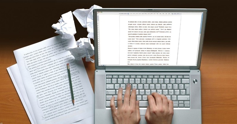 close up of a female hands typing script on a laptop