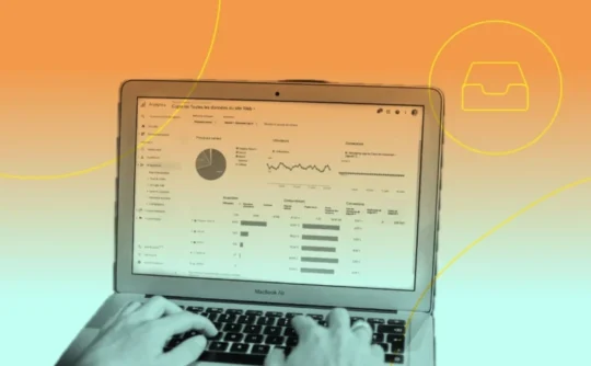 A person is analyzing website performance data on a laptop.