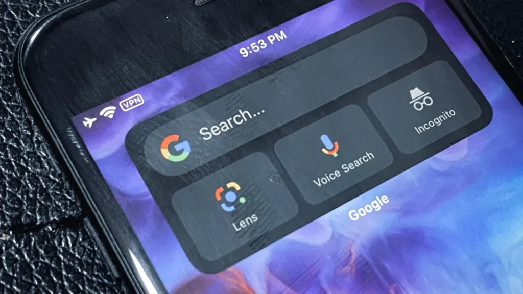 An image of a smartphone displaying the Google search interface, with the Voice Search option highlighted.