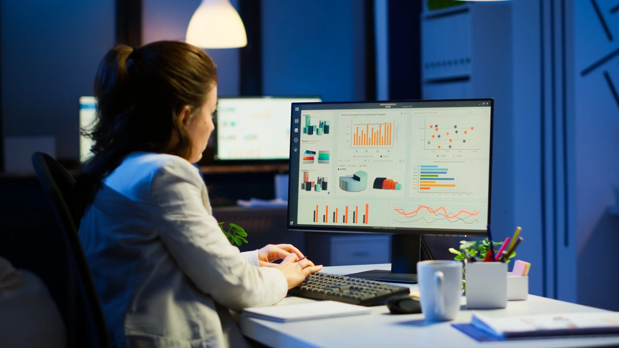 a woman checking google analytics report on a PC