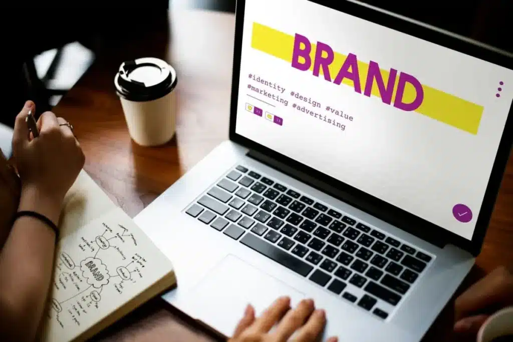 Laptop displaying brand identity and marketing concepts.